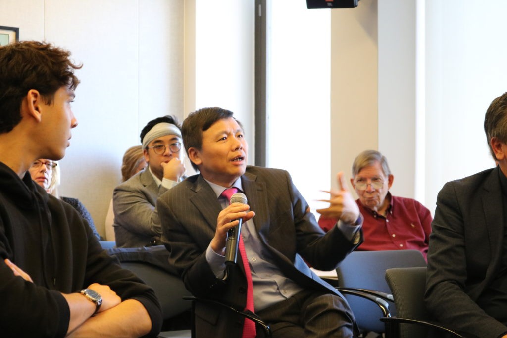 From the audience, H.E. Mr. Dang Dinh Quy, Permanent Representative of Viet Nam to the United Nations, asks panelists a question. image