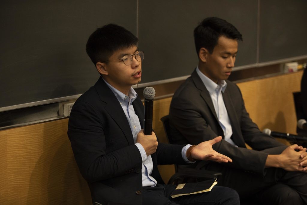 Joshua Wong (left) and Kai Ping “Brian” Leung (right) discuss the anti-extradition bill protest movement in Hong Kong. image