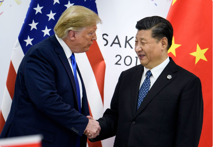 Trump shakes hands with Xi