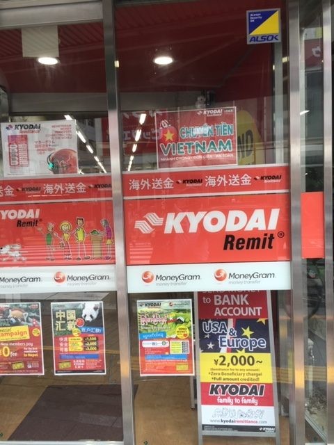 A storefront in Tokyo’s Shin-Okubo neighborhood advertising remittance services for foreign residents of Japan A storefront in Tokyo’s Shin-Okubo neighborhood advertising remittance services for foreign residents of Japan