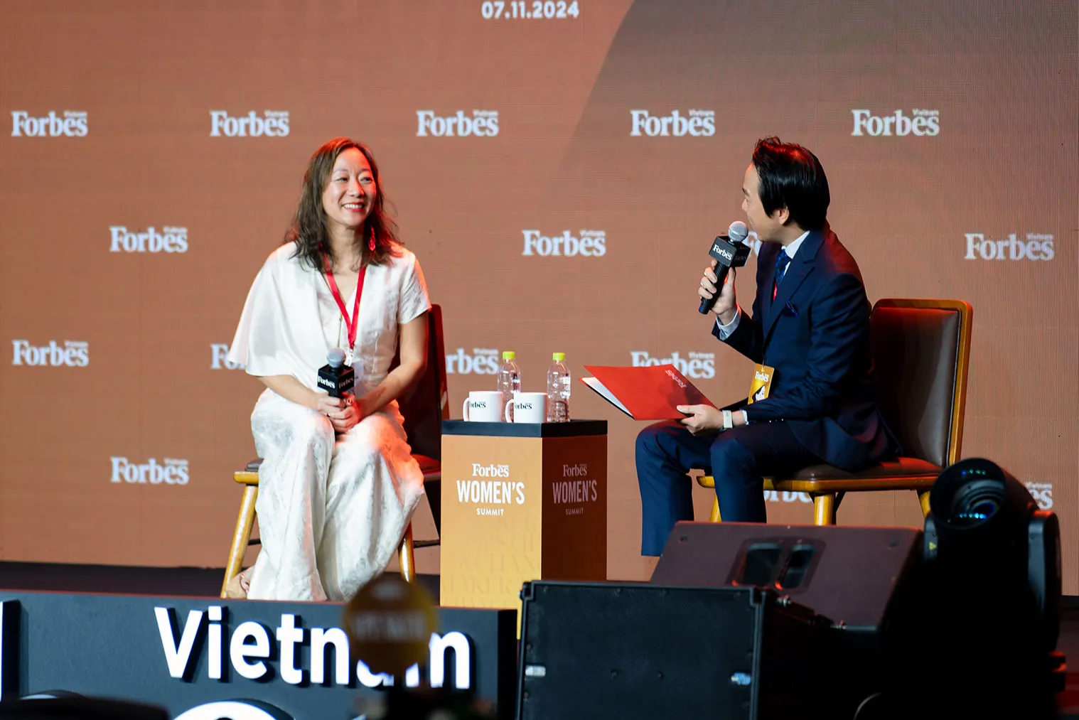 WEAI Director Lien-Hang Nguyen being interviewed by Hoang Ngoc Minh Toan at the Forbes Vietnam Women's Summit in Ho Chi Minh City on Nov. 7, 2024 (Photo courtesy Forbes Vietnam)