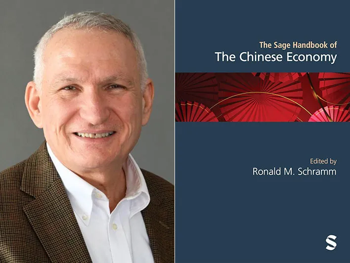 Professor Ronald M. Schramm (L), editor of "The Sage Handbook of the Chinese Economy" (R)